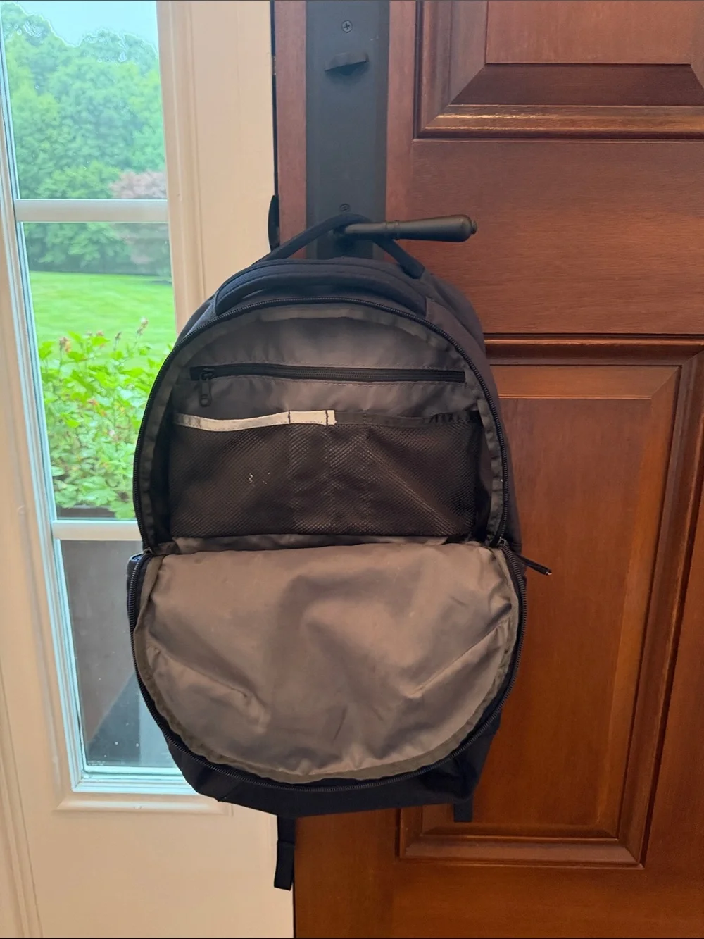 The North Face Navy Blue Backpack with White Bungee Cord